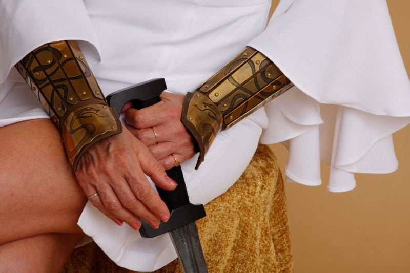 Armored Angel Hands with Sword to Protect Against Domestic Violence Abuse