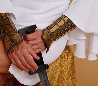 Armored Angel Hands with Sword to Protect Against Domestic Violence Abuse