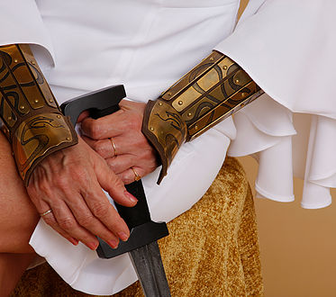 Armored Angel Hands with Sword to Protect Against Domestic Violence Abuse