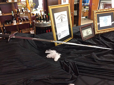 Armored Angel Sword on Table Showing Domestic Violence Abuse Prevention Setup